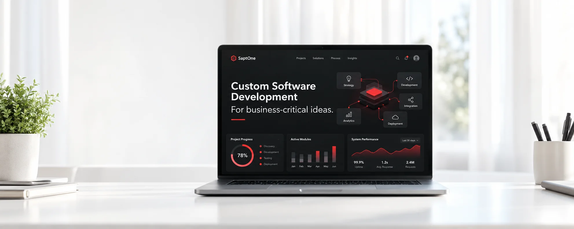 Custom Software Development project displayed on a laptop in a bright office
